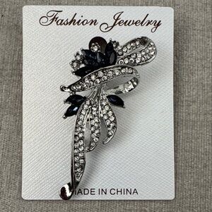 Elegant Silver and Blue Brooch